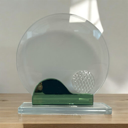 Golvstatyett glas med golfboll