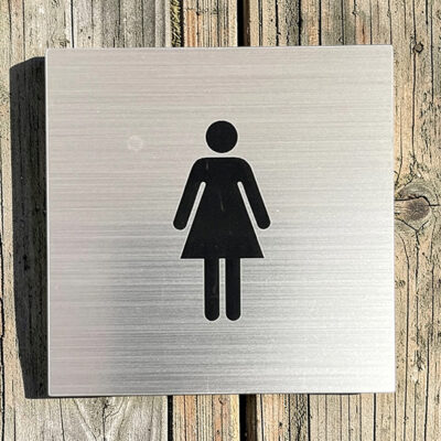 Toalettskylt Dam silver med svart symbol