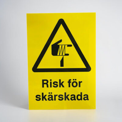 Varningsskylt risk för skärskada