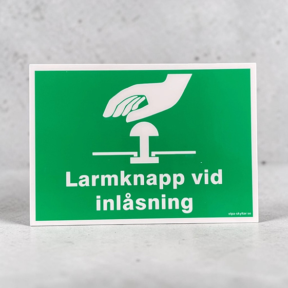 Utrymningsskylt efterlysande Larmknapp vid inlåsning